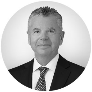 Black and white circular photo of Thomas Glanzmann